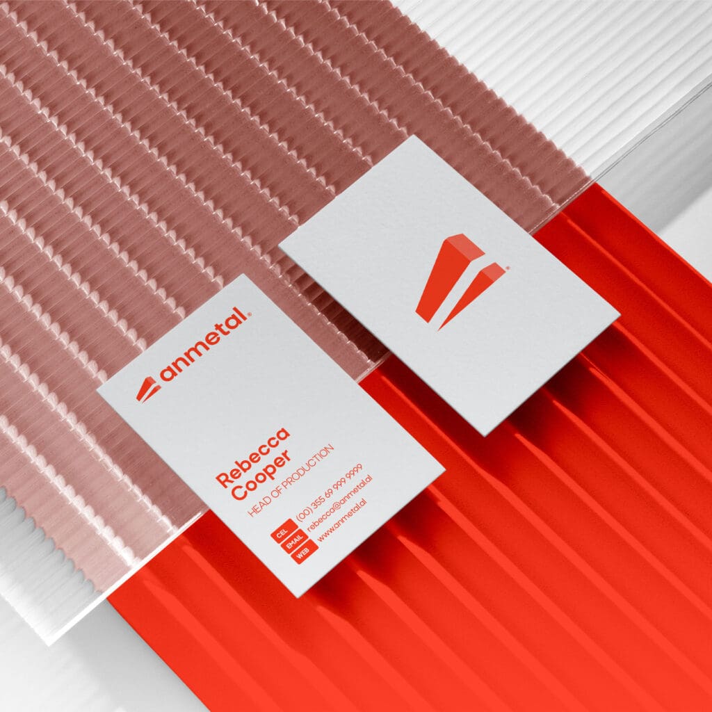 Branding agency designs Anmetal’s business cards, incorporating metallic elements to highlight industry leadership.